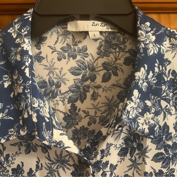 A beautiful button-up blouse to dress up or go casual. Navy & white floral. - Picture 2 of 8